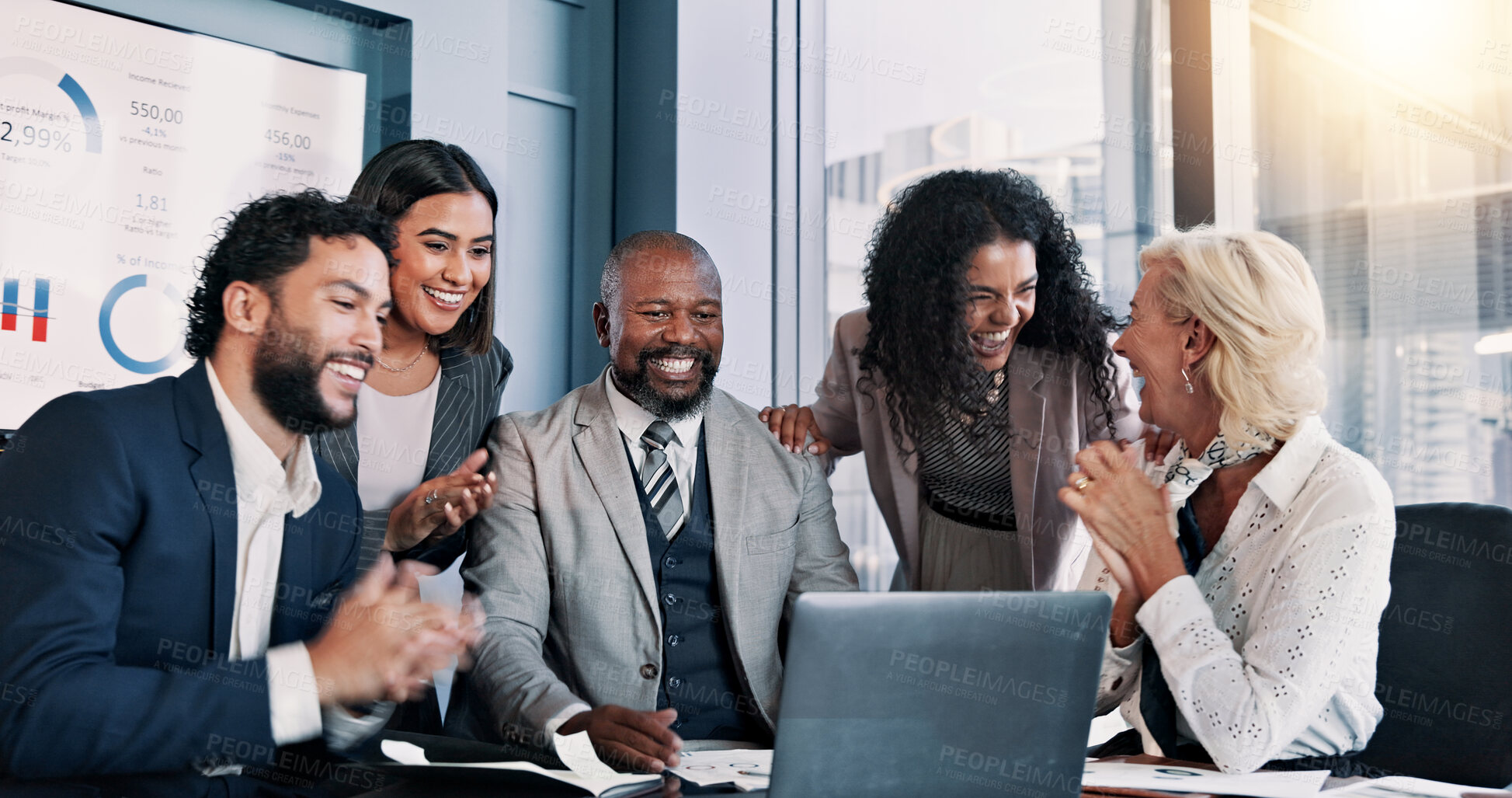 Buy stock photo Business people, laptop and meeting with applause for company performance, report or review at office. Group, clapping hands or celebration with graph, chart or project statistics for finance success