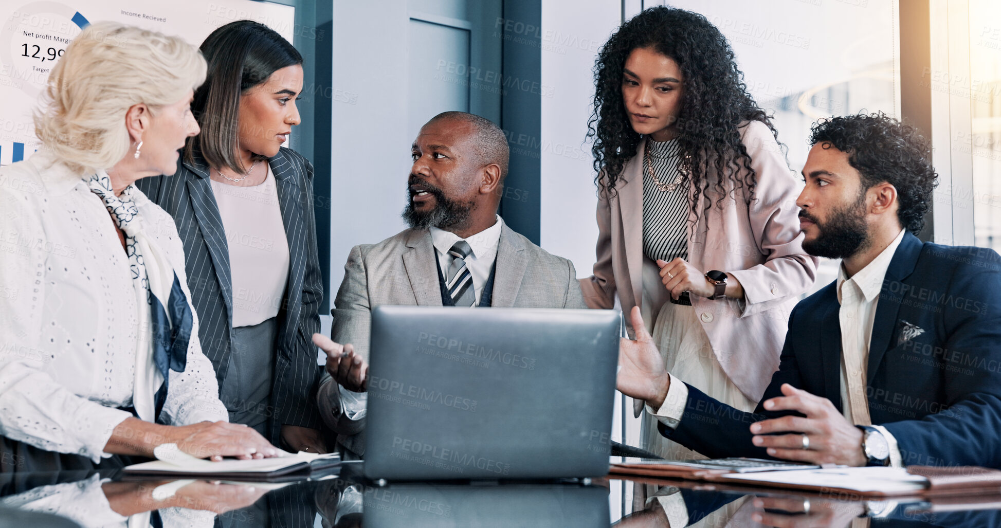 Buy stock photo Business people, laptop and meeting with discussion for company performance, report or review at office. Group, paperwork or analytics with graph, chart or project statistics for finance at workplace