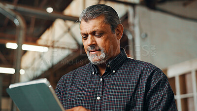 Buy stock photo Business, scroll and man in workshop, tablet and carpenter with email for online order. Mature person, employee and tech with checklist for inventory, furniture designer and planning on digital app