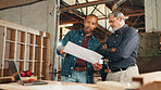 Planning, blueprint or people in carpentry workshop for factory, check inventory or manufacturing. Woodworking, carpenter or furniture design for timber, lumber or production in construction business