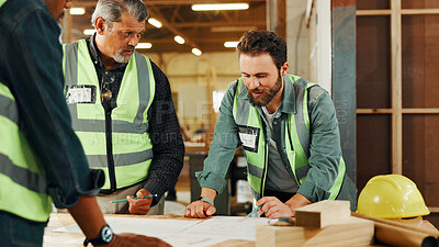 Buy stock photo Carpentry, teamwork and men in workshop with documents for furniture, restoration and lumber manufacturing. Construction, meeting and carpenters planning with planks, timber and board for renovation