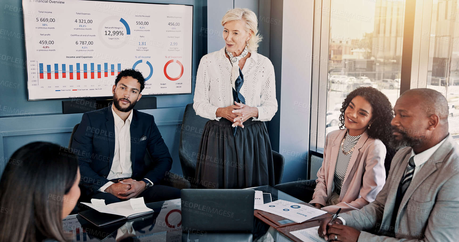 Buy stock photo Business people, laptop and meeting with presentation for company performance, report or review at office. Group, paperwork or analytics with graph, chart or project statistics for finance workplace