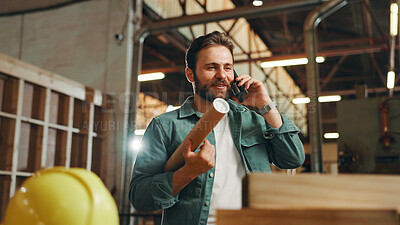 Buy stock photo Business, phone call and man in workshop, smile and blueprints with deadline for woodwork project. Happy person, employee and contractor in factory, cellphone or contact with online order or approval