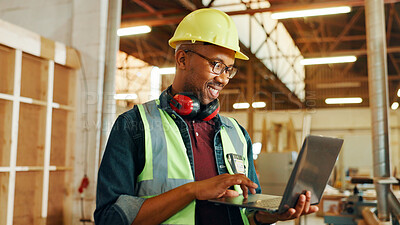Buy stock photo Engineer, man and carpenter with laptop in workshop for manufacturing and furniture production. Happy African person, carpentry and computer in factory for construction, building and woodwork design