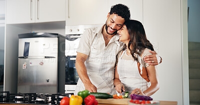 Buy stock photo Couple, happy and hug in kitchen with food, meal prep or cooking with support for healthy diet. Man, woman or love in home for recipe, bonding or husband with appreciation for wife in marriage