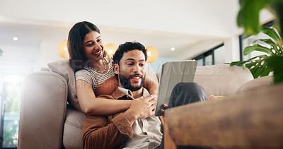 Buy stock photo Couple, relax and happy with tablet on sofa for internet browsing, online shopping and bonding together. People, smile and digital app in home for web scroll, streaming service and talking in lounge