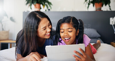 Buy stock photo Mother, child and relax with tablet on bed for playing educational games, streaming subscribe and bonding. Happy family, woman and girl with digital app in home for watching cartoon or online scroll