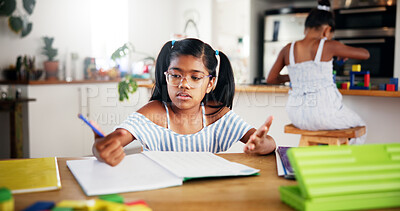 Buy stock photo Education, writing and kid with homework in house for learning, studying or development. Knowledge, student and girl child drawing with practicing for school assessment, test or assignment by table.