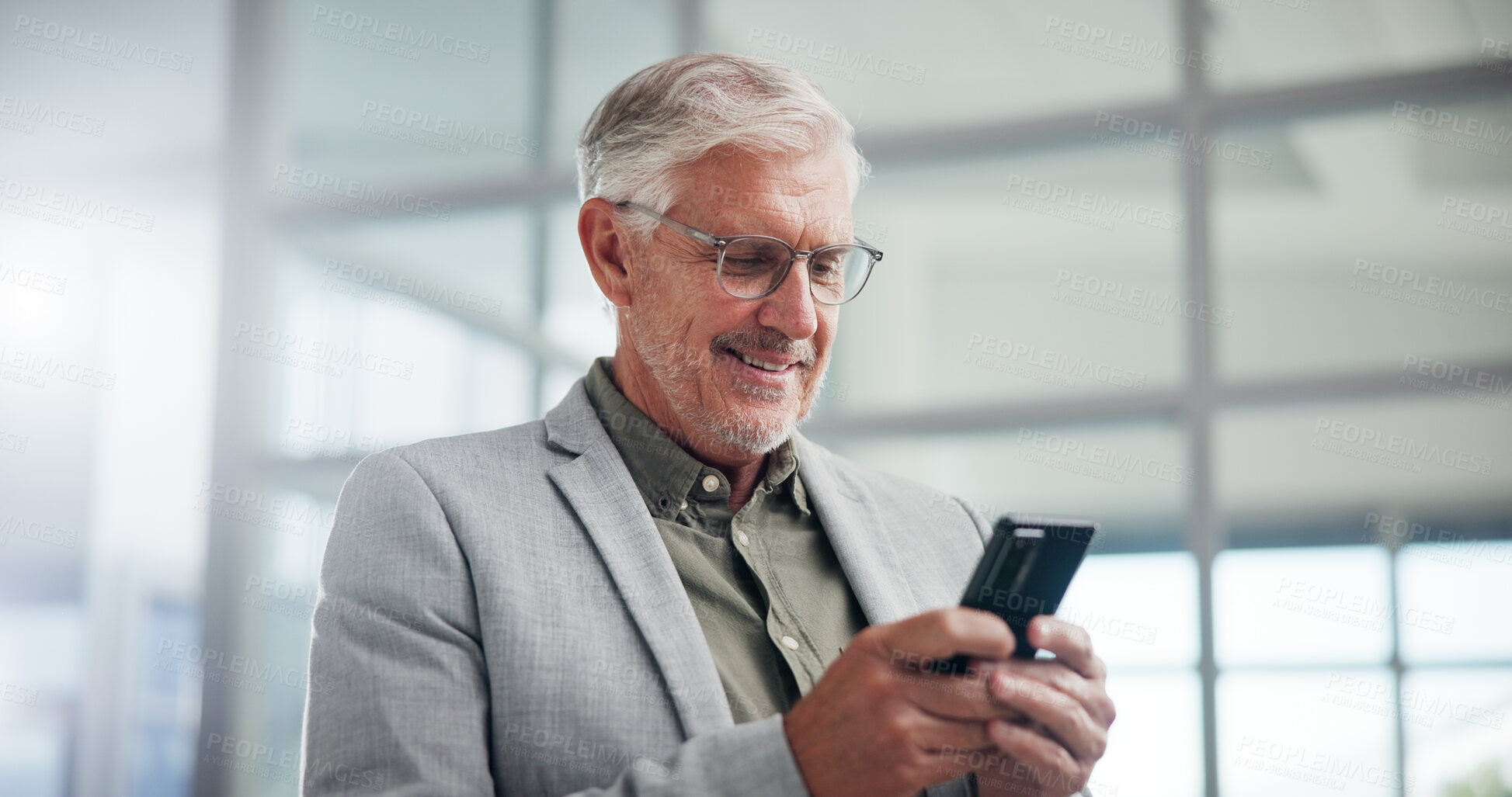 Buy stock photo Smile, mature businessman and CEO with mobile in office for typing, investment or reading financial news. Phone, corporate executive and check email for profit, private equity and venture capital