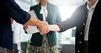 Handshake, deal and business people in office for investment agreement, partnership or meeting. Discussion, negotiation and stakeholder with finance team shaking hands for financial contract.