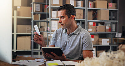 Buy stock photo Label, logistics and tablet with man in distribution depot for inventory or stock update. Boxes, supply chain and reading order note with employee in office for delivery, ecommerce or shipping
