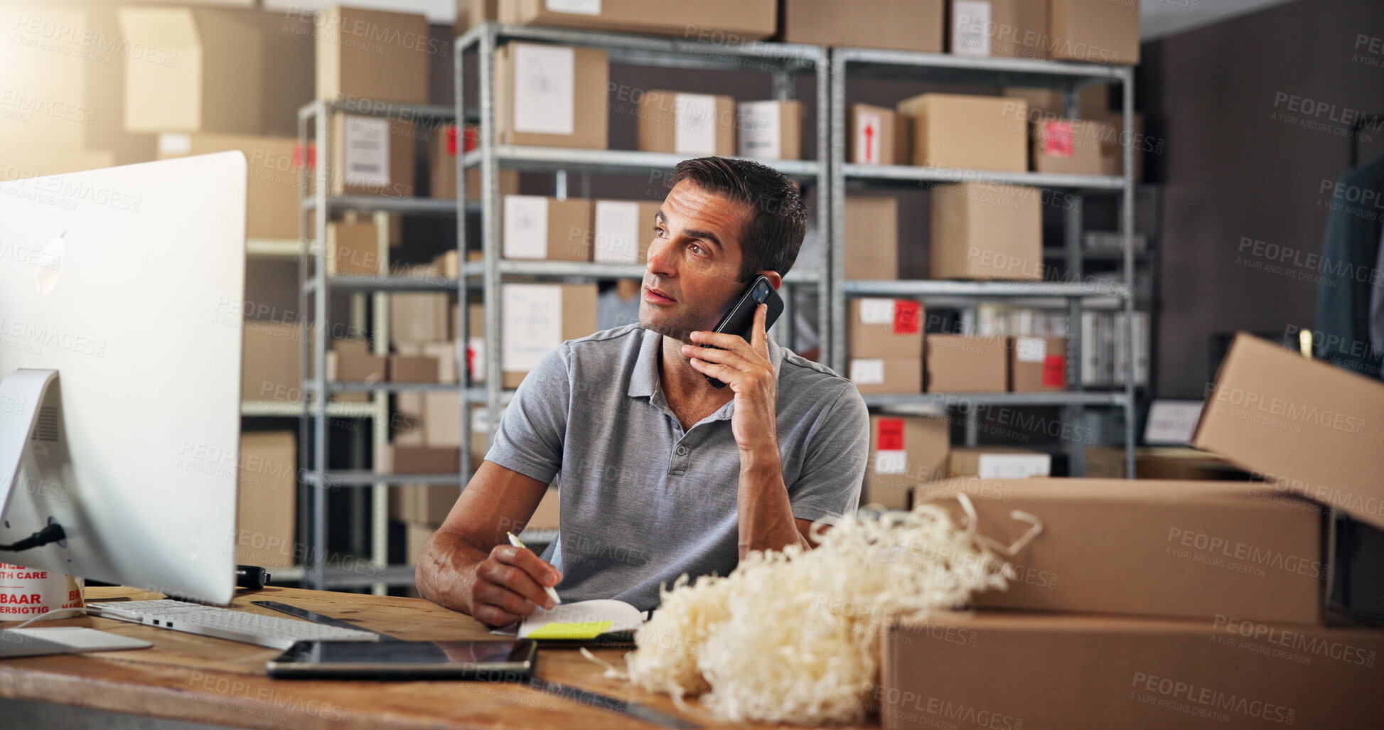 Buy stock photo Logistics, phone call and warehouse with man in distribution depot for communication or update. Boxes, conversation and supply chain with employee in office for delivery, ecommerce or shipping