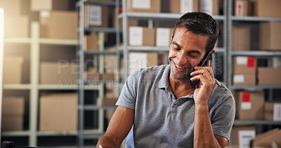 Buy stock photo Phone call, smile and supply chain with man in distribution center for communication or update. Boxes, conversation and logistics with employee writing in office for delivery, ecommerce or shipping