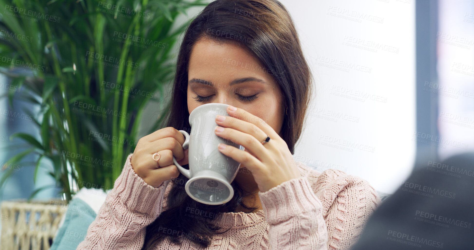 Buy stock photo Morning, eyes closed and woman with coffee on sofa with caffeine beverage, warm drink and cappuccino. Apartment, home and person with mug in living room with calm, peace and relaxing on weekend