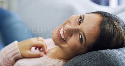 Buy stock photo Happy woman, portrait and relax with sofa for weekend, holiday or lying with comfort at home. Face, female person or joy with smile for comfy break, rest or day off on living room couch at house