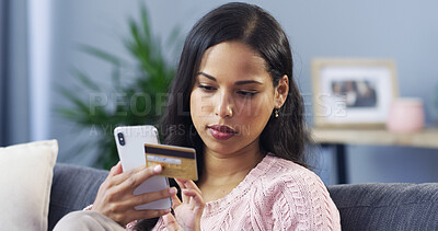 Buy stock photo Sofa, woman and phone with credit card for check, information and banking app for ecommerce. Home, female person and mobile with password for debit details, online shopping and relax in living room