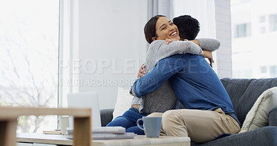 Buy stock photo Bonding, hug and couple in home, laptop and chilling in living room with woman, embrace and happy. Smile, man and excited with partner in lounge, coffee and celebration for vacation plans on website