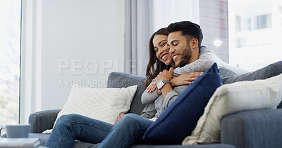 Buy stock photo Relax, love and hug with couple on sofa of home for bonding, support and care. Happiness, commitment and trust with man and woman in living room of apartment peace, smile and relationship romance