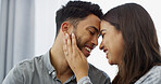 Bonding, embrace and couple with smile, home and romance in living room for man and woman in apartment. Lounge, people and happy for commitment in marriage, love and care for partner in new house