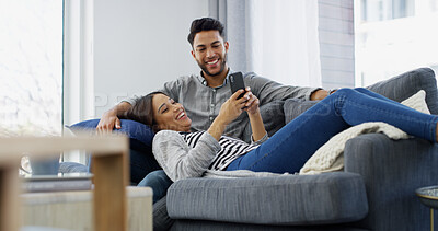 Buy stock photo Happy, couple and relax with phone at house for browsing social media, online shopping and bonding. People, mobile and website for ecommerce, banking app and partner decision for sign up subscription