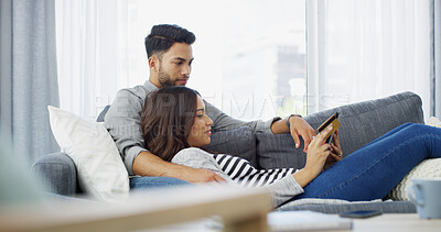 Buy stock photo Home, credit card and couple with tablet, online shopping and relax with ecommerce, rent and payment. Apartment, man and woman on couch, banking and technology with financial transactions or mortgage