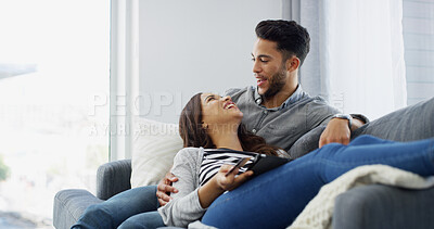Buy stock photo Payment, credit card and couple on sofa, tablet and relax with ecommerce, transactions or fintech. Rent, man or woman with online shopping, home or banking with mortgage, funny or laughing in lounge