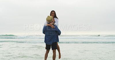 Buy stock photo Couple, lifting and beach for fun on vacation with honeymoon, holiday or bonding outdoor in nature. Excited woman, man and joy by sea for memory, playful date and happy with space and energy