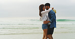 Hug, kiss and love with couple on beach for space, summer vacation and smile. Happiness, adventure and travel holiday with man and woman outdoors for romantic trip, bonding and trust together