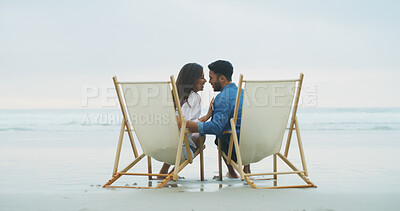 Buy stock photo Laugh, beach chair and couple with love on vacation for honeymoon, holiday or bonding outdoor. Woman, man and relationship by sea for romantic date, funny joke and care with connection by space