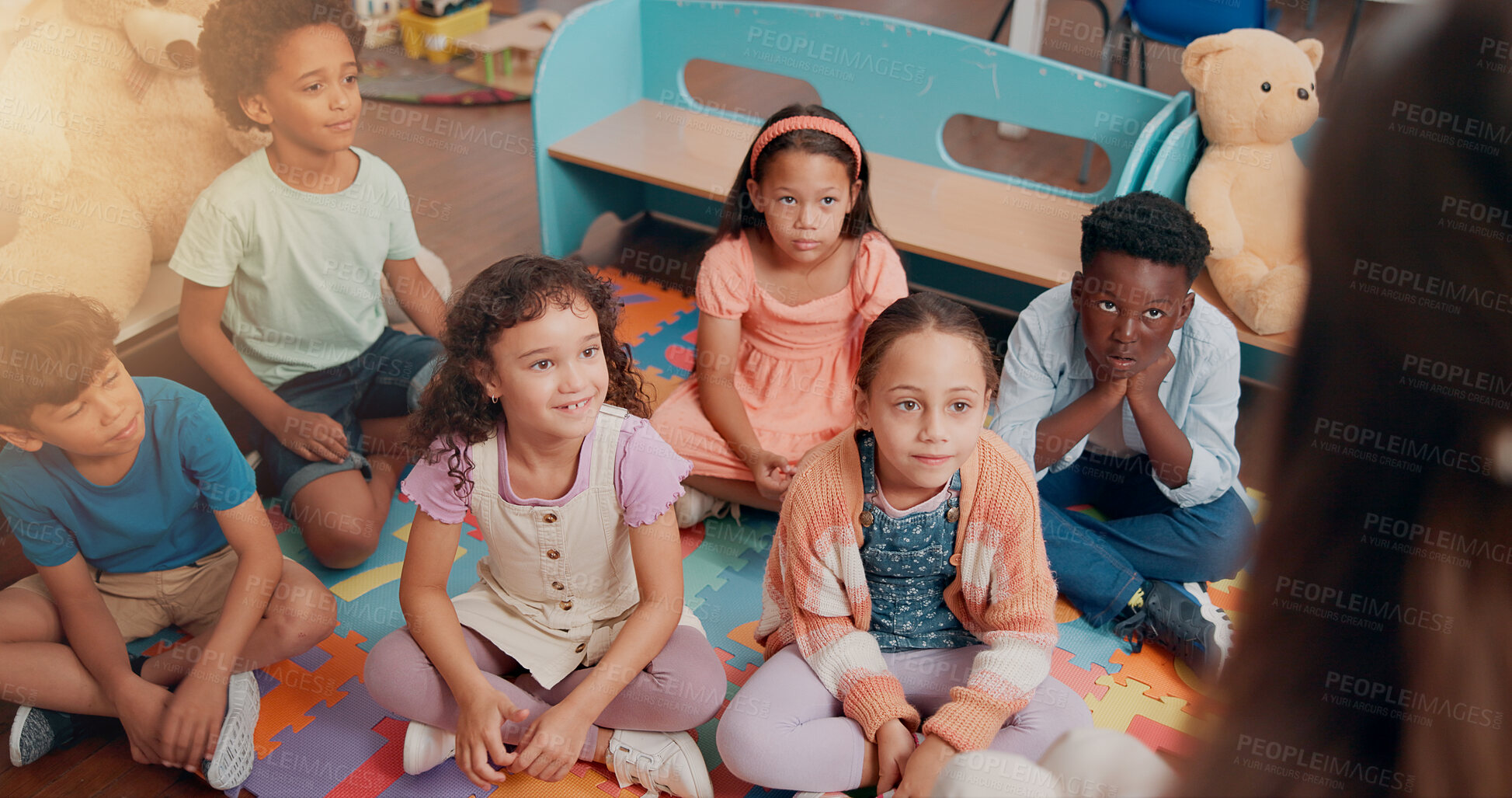Buy stock photo School, classroom and kids listening to teacher for reading lesson, education and learning language. Teaching, students and children on floor with educator for story time, development and knowledge