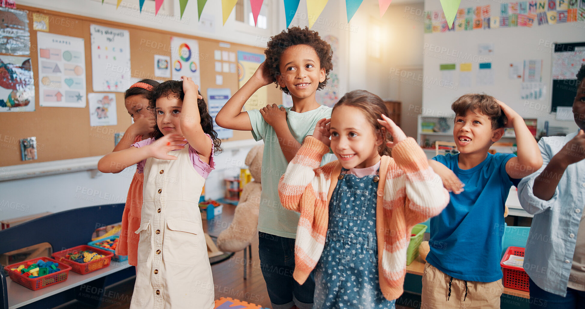 Buy stock photo Learning, dance and group of children in classroom together for coordination or motor skills development. Education, music or study with boy and girl students in school for scholarship as friends