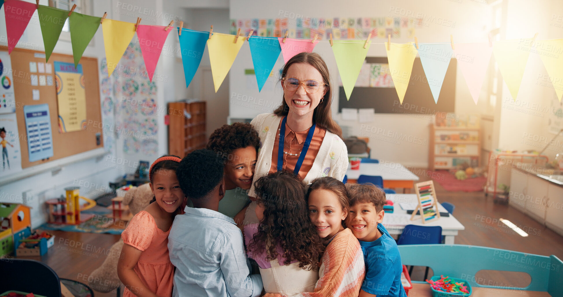 Buy stock photo Happy, portrait and children hugging teacher in classroom for bonding, learning and thank you. Love, kids or students embracing woman educator for greeting in morning for lesson at elementary school.