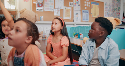 Buy stock photo Classroom, students and children on floor listening to teacher for reading lesson, education and learning. Youth, preschool and kids with educator for storytelling, language development and knowledge