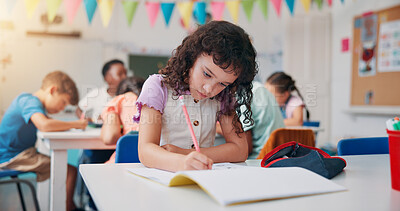 Buy stock photo Notebook, education and writing with girl in classroom for child development, future and learning. Academy, growth and scholarship with kid studying in school for knowledge, lesson and students
