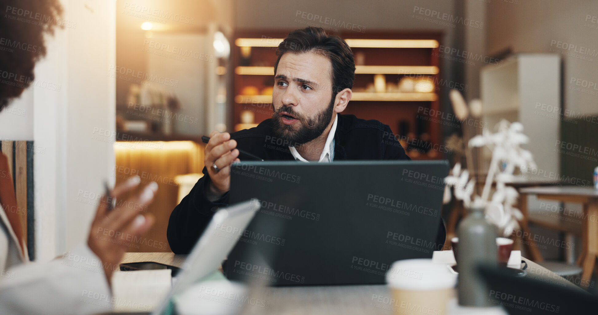 Buy stock photo Business, man and laptop in meeting at cafe for planning, discussion and ideas for project. Staff, conversation and online with schedule update, proposal feedback and B2B collaboration in coffee shop