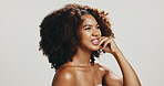 Glow, skincare and beauty with woman in studio for spa treatment, self care and cosmetics. Aesthetic, collagen and dermatology with African person on white background for shine, smile and salon