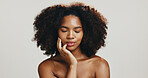 Glow, skincare and beauty with face of woman in studio for spa treatment, self care and cosmetics. Aesthetic, collagen and dermatology with African person on white background for shine and salon