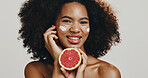 Grapefruit, face cream and portrait of woman for skincare, natural products and facial treatment. Dermatology, spa and person with fruit for wellness, organic cosmetics and beauty on white background