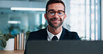 Man, lawyer and happy in office by computer, review or research for legal journal, article or study. Person, laptop and attorney with writing for newsletter with smile, editing or project at law firm