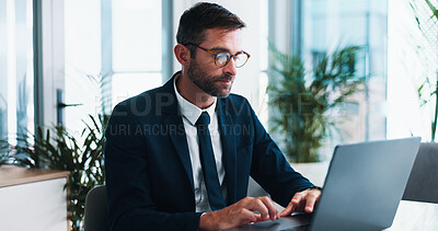 Buy stock photo Businessman, typing and browsing with laptop for financial report, review or corporate statistics. Male person, accountant or office with computer for company finance, budget or planning at workplace