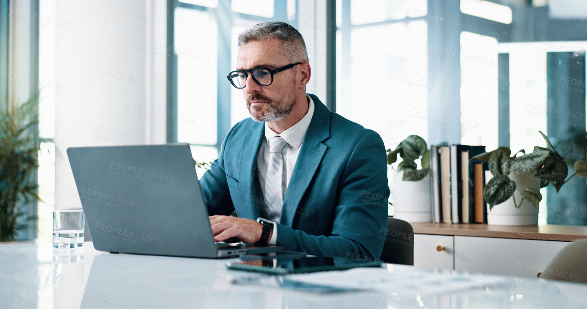 Buy stock photo Accountant, laptop and mature businessman in office for financial analysis, budget review and company investment. Corporate, manager and person on computer for research, audit report and planning