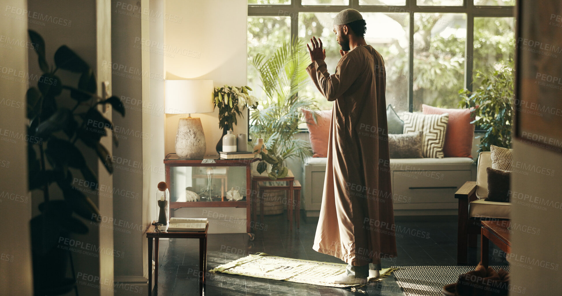 Buy stock photo Man, islamic and prayer with faith at house for spiritual worship, praise Allah and belief in Ramadan. Muslim person, praying and dua in salah, forgiveness and mindfulness of fasting tradition of God