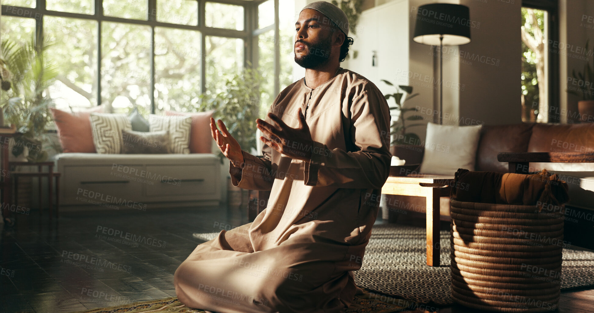 Buy stock photo Islam, worship and dua with man in home for ramadan kareem, spiritual and prayer. Floor, faith and eid Mubarak with muslim person and salah in living room for gratitude, Allah praise and religion