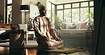 Islam, prayer and holy with man at home for ramadan kareem, spiritual and worship. Religion, faith and eid Mubarak with Muslim person and salah in living room for gratitude, Allah praise and dua