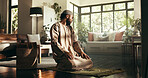 Muslim man, faith and mat in home with worship for ramadan, Islam or relationship with Allah. Person, hijab and morning for prayer, religion and blessing with God for fasting, dua and praise in house