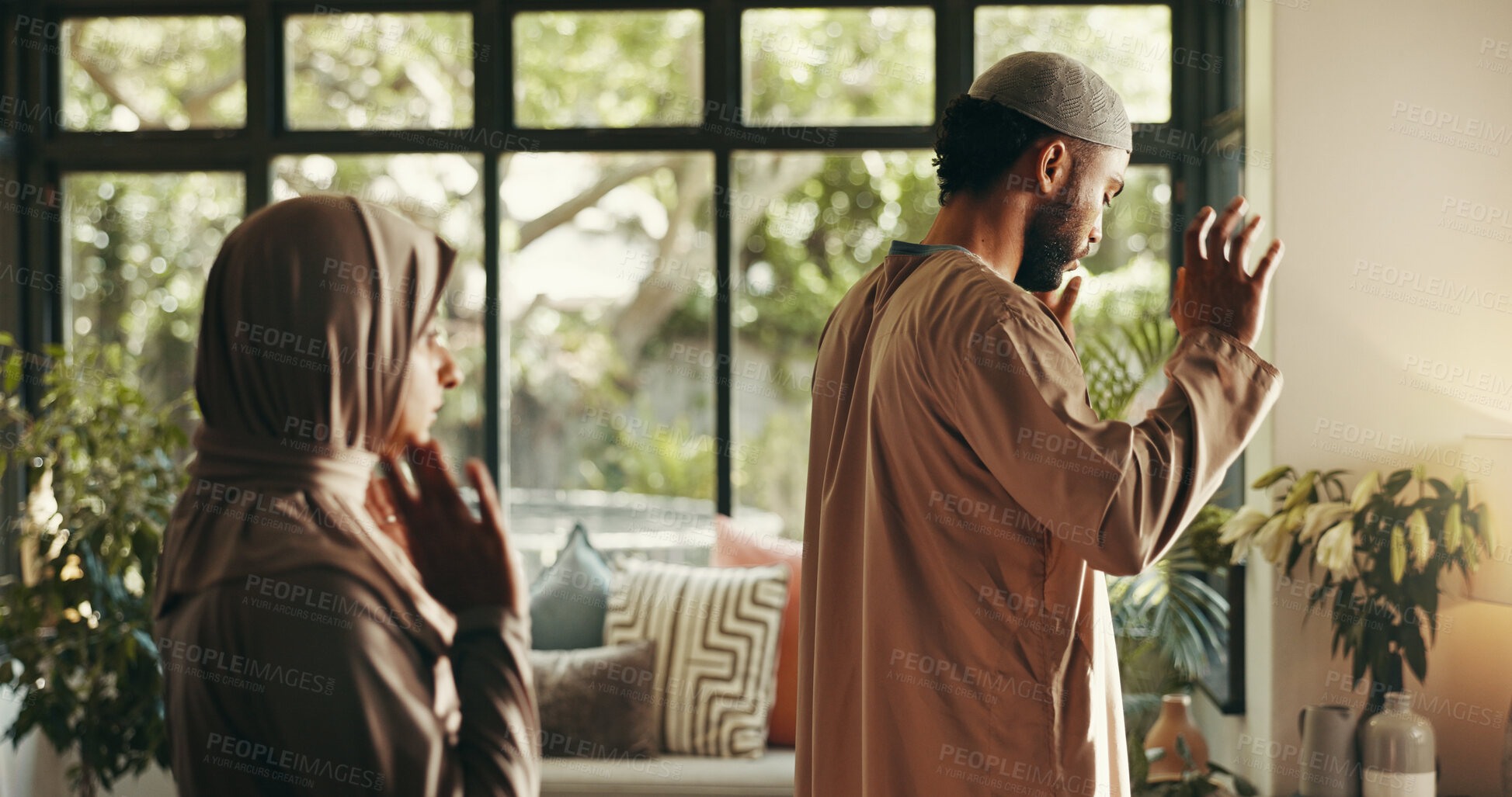 Buy stock photo Muslim, couple and praying faith at house for spiritual worship, religion belief and praise to Allah. People, guidance and dua for Eid Mubarak, holy devotion and gratitude together of Islamic culture