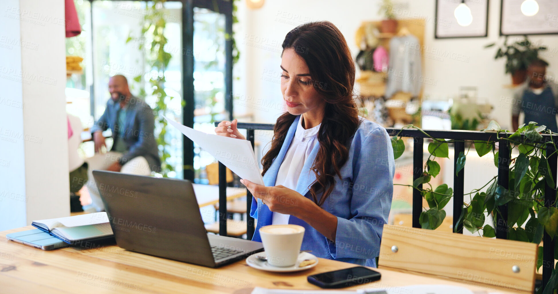 Buy stock photo Documents, research and laptop with woman in cafe for remote worker, reading and planning. Feedback, paperwork and client report with person in coffee shop for freelancer, invoice and information