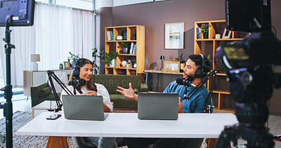 Buy stock photo Laptop, microphone and recording with people in home living room for live streaming a podcast. Broadcast, camera or conversation with man and woman influencer in apartment for subscription service
