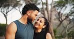 Fitness, hug and smile with couple outdoor together for cardio, health or sports training. Bonding, exercise or love with man and woman embracing in forest for challenge, performance or workout