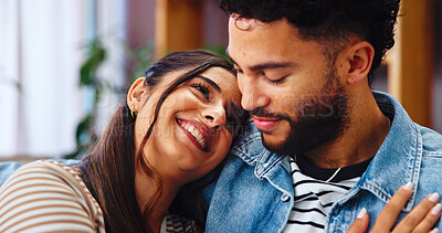 Buy stock photo Home, hug and couple on sofa, love and bonding together with marriage, happiness and care. Embrace, apartment and man with woman, calm and resting with romance, relationship and relax in living room